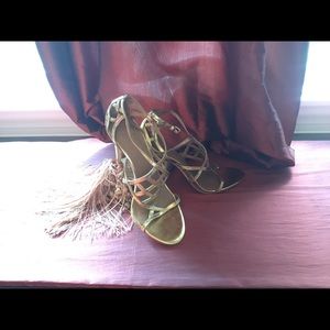 Tory Burch all leather gold heels.